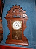Seth Thomas "Eclipse" walnut mantel clock with 8-day mechanism.