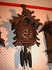 Cuckoo and Quail wall clock with carved Pine Cones.