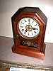 Miniature 30-hour shelf or mantle clock, known as a COTTAGE CLOCK.