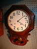 Anglo American 8-day wall clock with hourly strike.