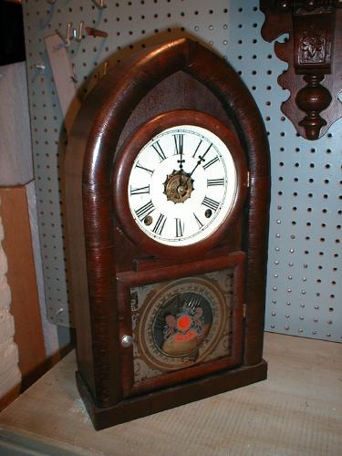 Mahogany Veneered beehive mantle clock with the Canadian Crest on door glass. — Antique Clocks Price Guide