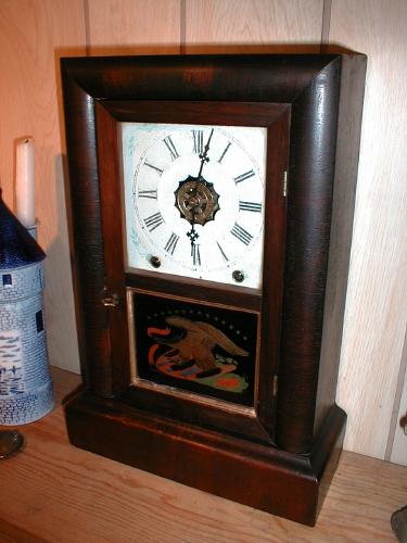 Eight-day mantle clock with strike on the hours and alarm mechanism. — Antique Clocks Price Guide