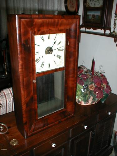 Double "O.G." mantle clock with eight-day strap brass — Antique Clocks Price Guide