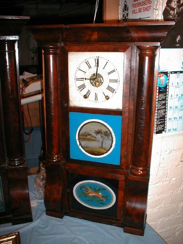 Cornice and column mantle clock with eight-day weight-driven brass — Antique Clocks Price Guide