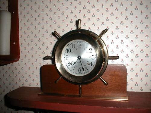 Ship's bell clock with eight-day movement. — Antique Clocks Price Guide