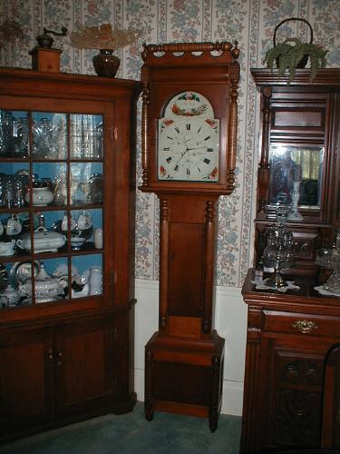 Eight-day Pennsylvania tall case clock with rolling pin top. — Antique Clocks Price Guide