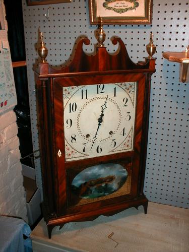 Pillar and scroll mantle clock with 30-hour wooden works. — Antique Clocks Price Guide