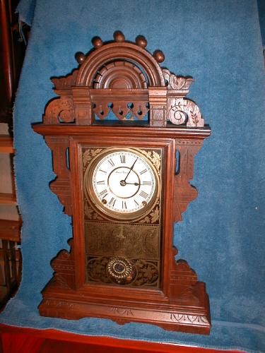 Seth Thomas "Eclipse" walnut mantel clock with 8-day mechanism. — Antique Clocks Price Guide
