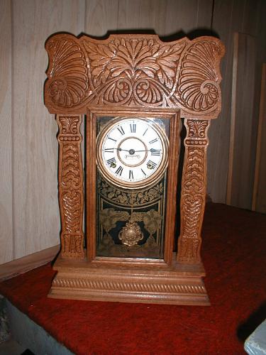 "The Arctic" pressed Oak gingerbread clock. — Antique Clocks Price Guide