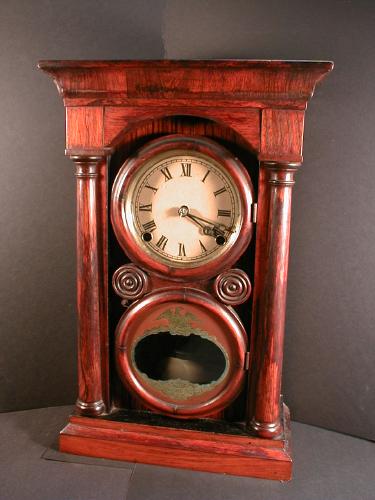 E. Ingraham  ARCH COLUMN No. 1  miniature cornice and column mantle clock with reverse painted door glass. — Antique Clocks Price Guide