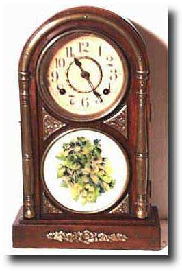 Shelf clock with music box that plays on the hour; c. 1900 — Antique Clocks Price Guide