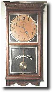 Waterbury Regulator Wall Clock, "Stork" model, — Antique Clocks Price Guide