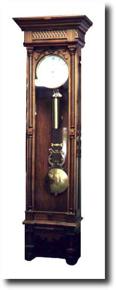 Colonial Pinwheel Wall Clock, circa 1976 — Antique Clocks Price Guide