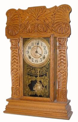 C.1915, E. Ingraham, ÓARCTICÒ pressed oak gingerbread from their Ocean series, 8-day time and strike. — Antique Clocks Price Guide