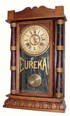 C.1885, Gilbert ÒEUREKAÓ, time, strike and simple calendar, 8-day in oak case. — Antique Clocks Price Guide
