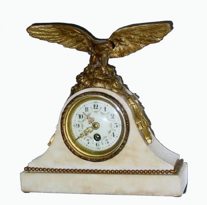C.1890, French, Small Figural clock for a manÕs desk, a bronze spread-wing eagle just landing on some rocks. — Antique Clocks Price Guide