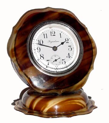 C.1920, E. Ingraham, Tortoise shell /appearance/ miniature boudoir clock, 30 hour with porcelain dial. — Antique Clocks Price Guide
