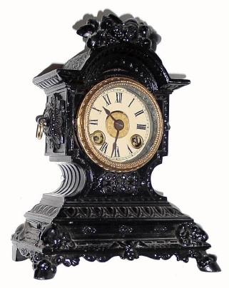 C.1860, Terry Clock Co, Waterbury, 30 hour, time and alarm bedroom clock, painted white metal. — Antique Clocks Price Guide