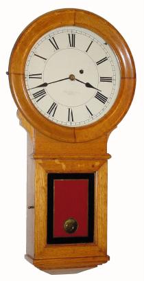 C.1900, E. Howard and Co., ÓRegulator No. 70Ò round drop office clock in oak. — Antique Clocks Price Guide