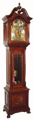 C.1890, German, Korfhage, (Patent 1885), for J. E. Caldwell, PhiladÕa, quarter chime tall clock with 8-bells and 5 gongs, in a well proportioned oak case with carved accents. — Antique Clocks Price Guide