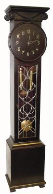 C.1920, Waterbury ÒPILLARÓ tall clock, 8-day 2-weight, time and strike, with leaded glass door and ebony finish. — Antique Clocks Price Guide