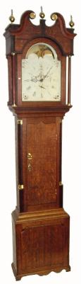 C.1825, English, 30-hour Painted Dial tall clock with rolling moon, oak case with broken arch hood. — Antique Clocks Price Guide