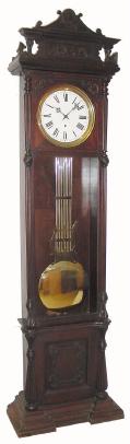 C.1905, Waterbury Clock Co., "Regulator No. 69", in mahogany, with Graham dead beat escapement, wide rod lyre pendulum and music scroll hands. — Antique Clocks Price Guide