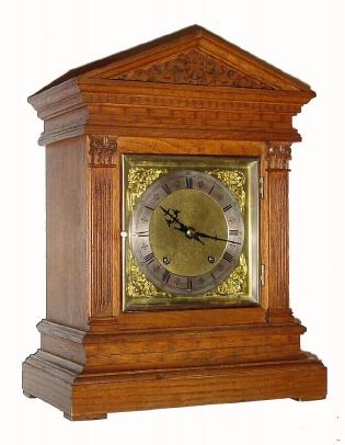 C.1890, German, Winterhalder and Hofmeier, 8-day time, 1/4 hour strike mantel clock in an architectural oak case with facade appearing like brick. — Antique Clocks Price Guide