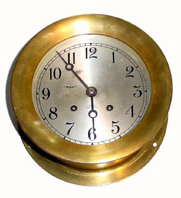 C.1955, Chelsea, 6Ó Dial, ShipÕs Bell, 8-day, in a brass case with hinged bezel and button latch. — Antique Clocks Price Guide