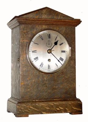 C.1938 (dated), English, signed F. W. Elliott, oak cased fusee timepiece, made for the Royal Air Force, and with Her MajestyÕs crest and RAF engraved below 12 on the dial. — Antique Clocks Price Guide