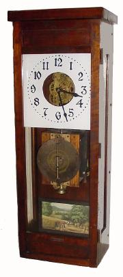 C.1925, McClintock and Co, Minneapolis, Minn, bank time-lock and protection systems clock, now with a Symphonion 8Ò disc playing music box and 6 discs. — Antique Clocks Price Guide