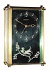 C.1960, LeCoultre, 8-day, novelty alarm timepiece. This little alarm plays a small spring music box inside. The case houses a jeweled escapement watch like movement. 