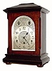 C.1905, German, 3-train Westminster Chime mantel clock, mahogany case with embossed arched dial and small dials for chime/ silent and fast/ slow. 