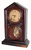 C.1885, E. Ingraham, ÒDORICÓ in rosewood, 8-day time and strike with exposed pendulum. 