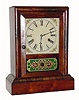 C.1890 William L. Gilbert Clock Co., 30-hour time/strike rosewood veneered cottage clock. 