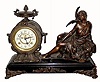C.1913 New Haven Clock Co., ÓLa CaresseÒ, 8-day time/strike spelter figural mantel clock, seated female figure, caressing a dove at her cheek. 