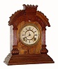 C.1894 Ansonia Clock Co., ÓTunisÒ, 8-day time/strike walnut cabinet model mantel clock.