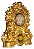 C.1855, American Clock Co., cast metal front shelf clock [Muller], depicting 3 children amongst the grapes. 