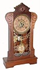 C.1890, F. Kroeber, NY, ÒCLINTONÓ walnut cased shelf clock, 8-day time, strike and alarm with optional indicator pendulum. 
