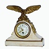 C.1890, French, Small Figural clock for a manÕs desk, a bronze spread-wing eagle just landing on some rocks. 