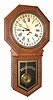 C.1911 E. Ingraham Co., ÒHartfordÓ, 8-day pressed oak calendar timepiece, long drop octagon. 