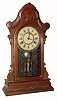 C.1885 New Haven Clock Co., ÒOderÓ, 8-day time/strike walnut mantel clock. 