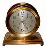 C.1920, Chelsea, 8.5Ó Dial, ShipÕs Bell on Base with ball feet, the dial engraved with the name of the retailer, ÒGrogan and Co., PittsburghÓ, hinged bezel with button latch. 