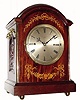 C.1890, English, 3-Fusee, Double Chime, 8-Bell bracket clock, mahogany, with fine inlay and fretted sides, medium size (see also lot 428). 