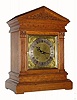 C.1890, German, Winterhalder and Hofmeier, 8-day time, 1/4 hour strike mantel clock in an architectural oak case with facade appearing like brick. 