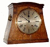 C.1910, German, Winterhalder and Hofmeier, oak cased, Arts and Crafts style, quarter striking mantel clock, 8-day with silvered dial, two gongs. 
