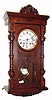 C.1900, Lenzkirch, Quarter Striking wall clock, serial number 1,368,516, in an oak case with turned half columns and carved accents. 