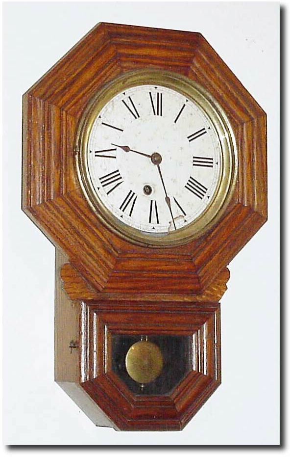 C.1910, E. Ingraham and Co., "8-Inch Ingot", in oak, as- found with no top glass. — Antique Clocks Price Guide