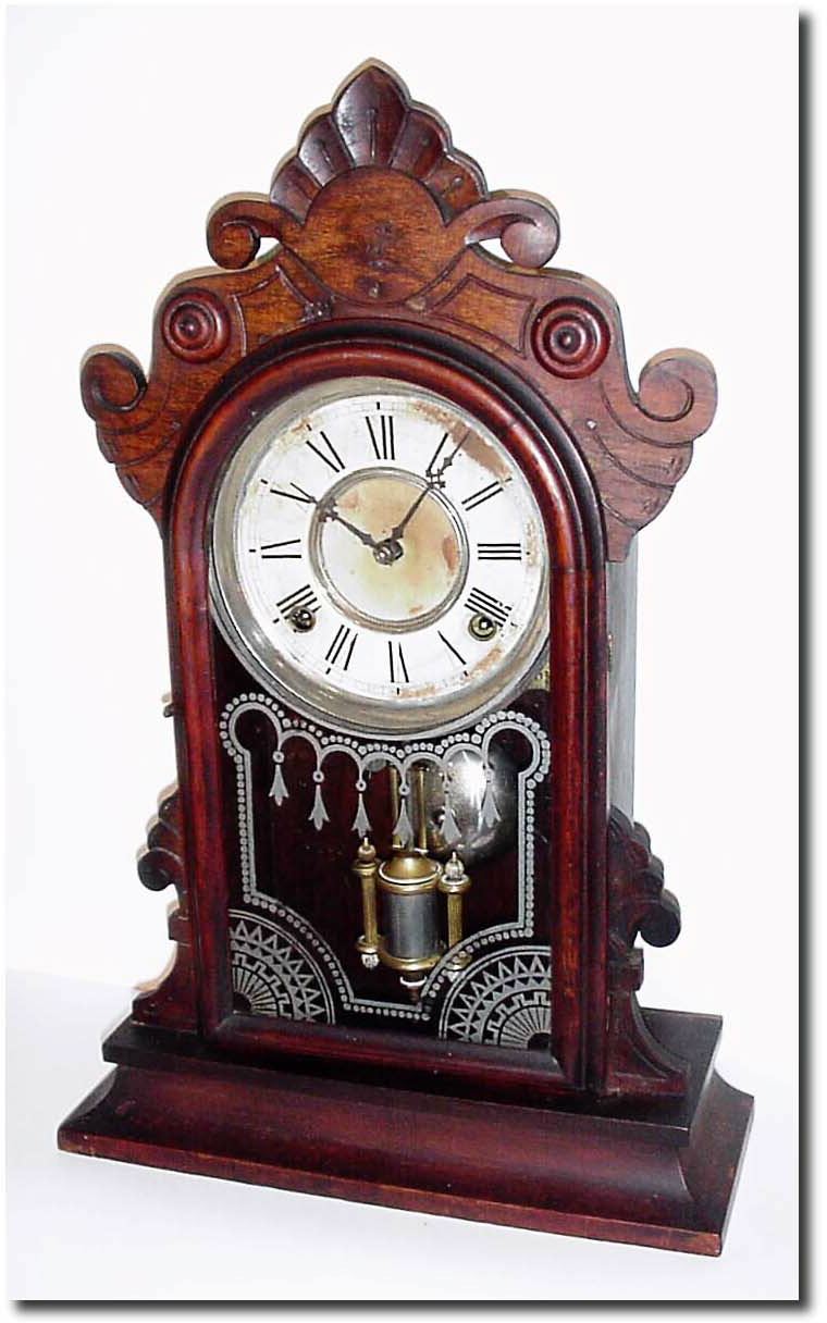 C.1885, Wm.L. Gilbert, "Parlor", Walnut Mantel clock in generally good condition. — Antique Clocks Price Guide
