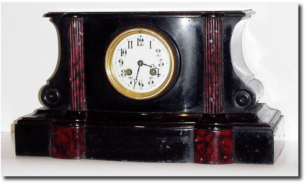 C.1895, French, Marble Mantel Clock, black and red, with 8-day bell strike movement and good porcelain dial. — Antique Clocks Price Guide